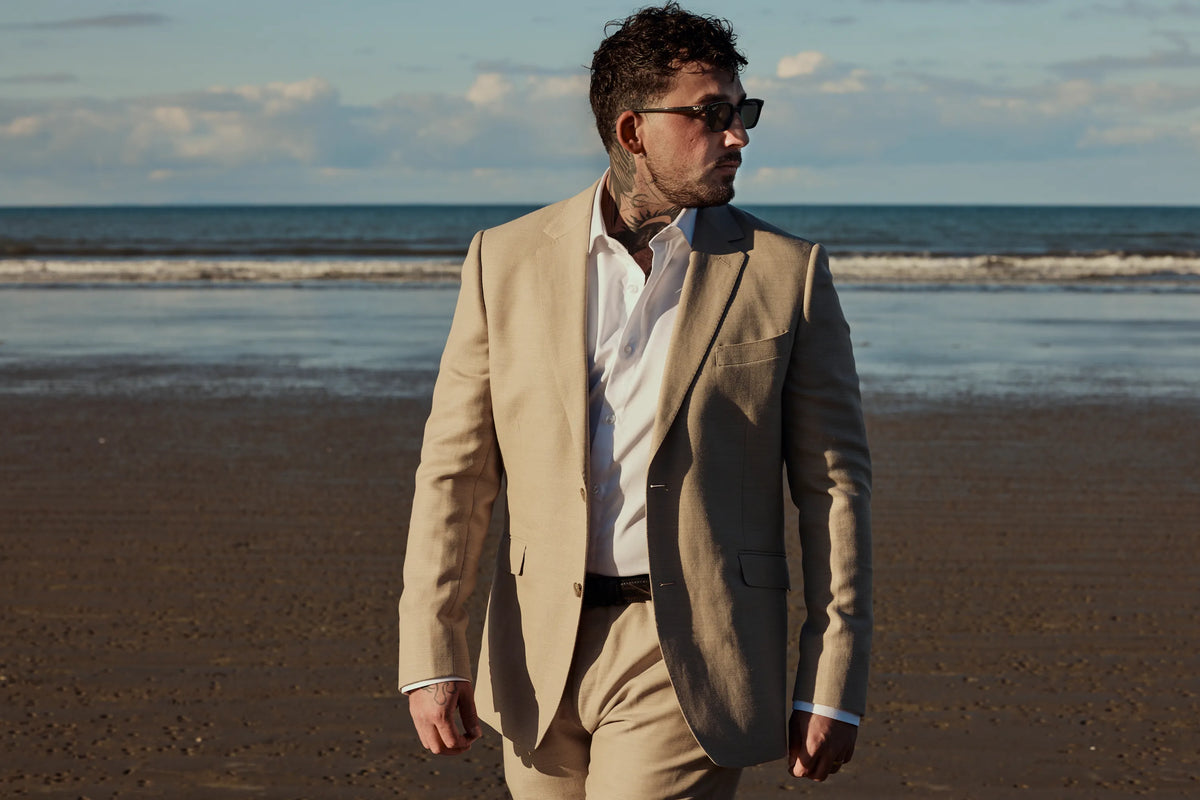 GRAPHICA Global Top 100 tattoo artist Coen Mitchell on the beach, SKINGRAPHICA Featured Artist